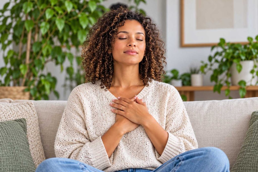 Peaceful Woman Meditating at Home